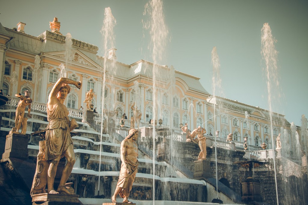 Beautiful scene of the famous fountains in front of the royal Peterhof in summer